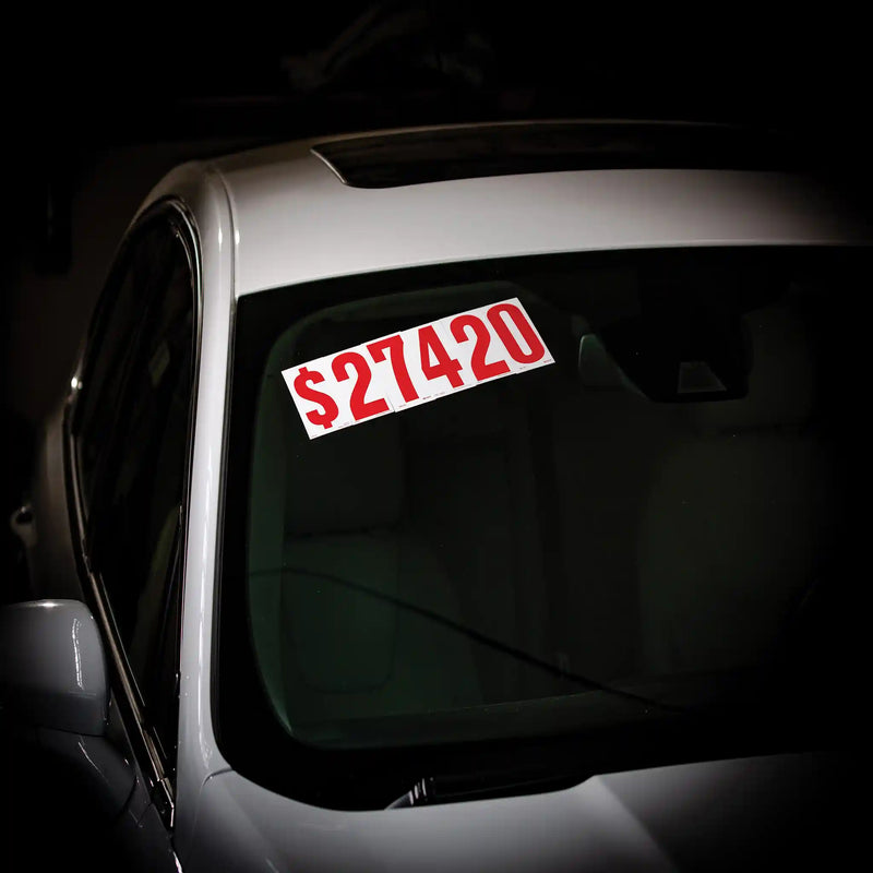 White and Pricing Numbers on windshield