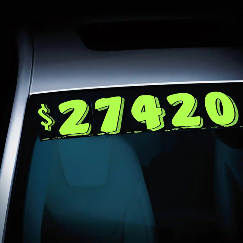 7.5 black and Chartruse pricing numbers on a windshield