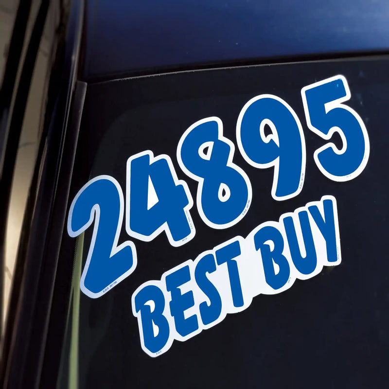 Blue and white die cut numbers on car dealer lot. 