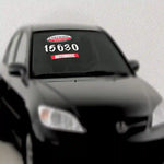 Thumbnail for White Sign Painter Windshield Numbers on a dealer lot.