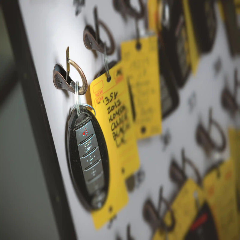 Portable key board for car dealers keys.