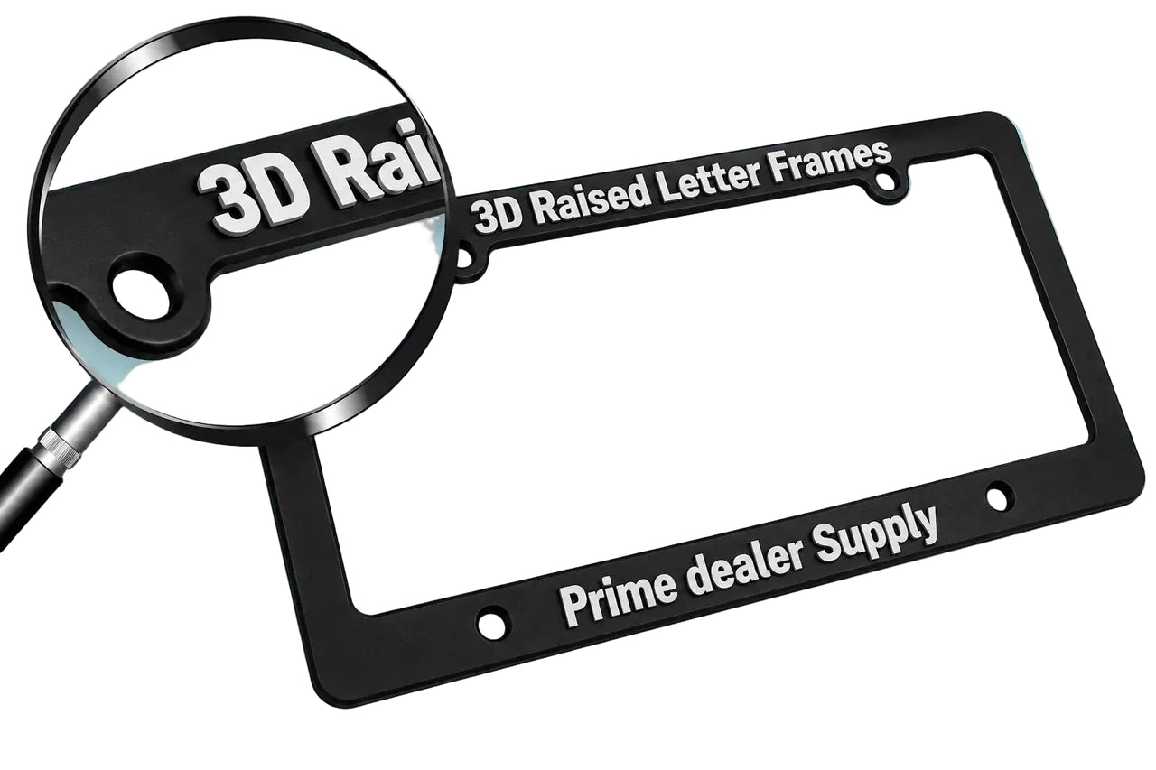 Black license plate frame with '3D Raised Letter Frames' and 'Prime dealer Supply' text, magnifying glass on a light blue background.
