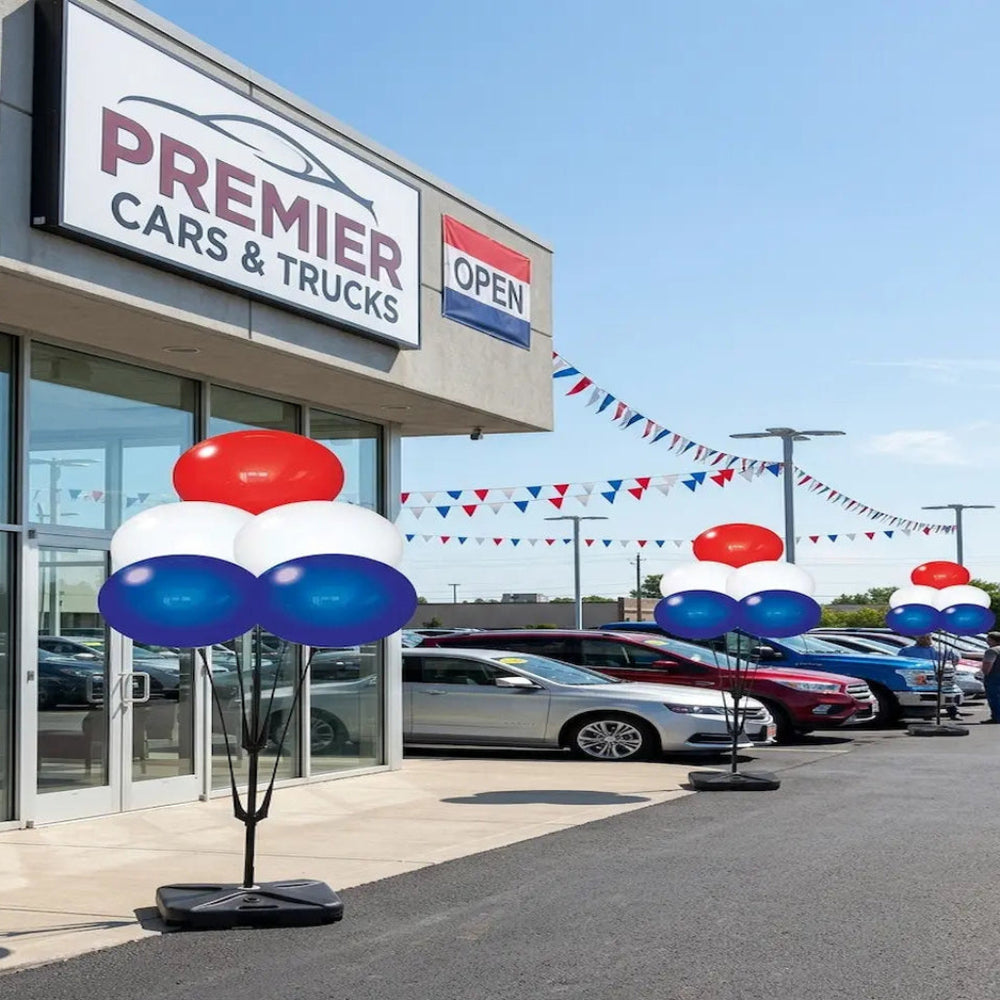 Cars & Trucks dealership with cars on display and festive 
Reusable balloons outside.