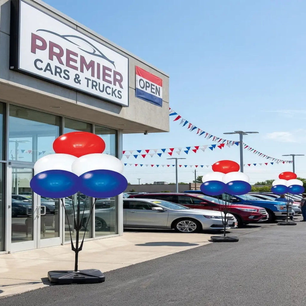 Cars & Trucks dealership with cars on display and festive 
Reusable balloons outside.
