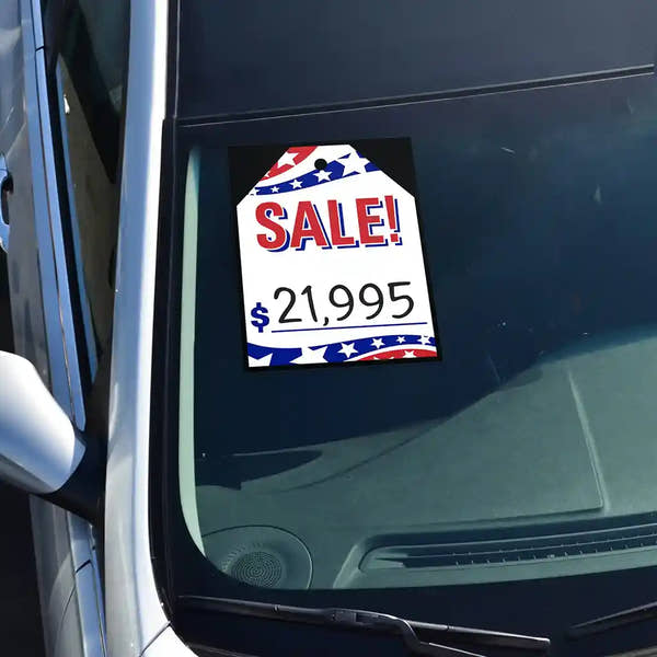 Sale Patriotic color sticker on a windshield.