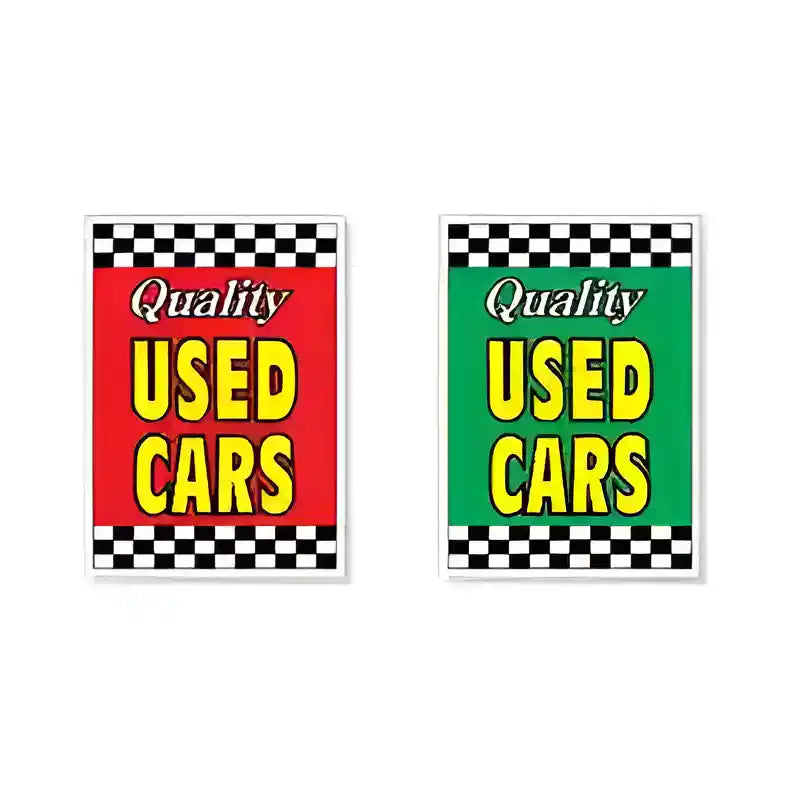 Two 'Quality Used Cars' signs with checkered borders on a white background.